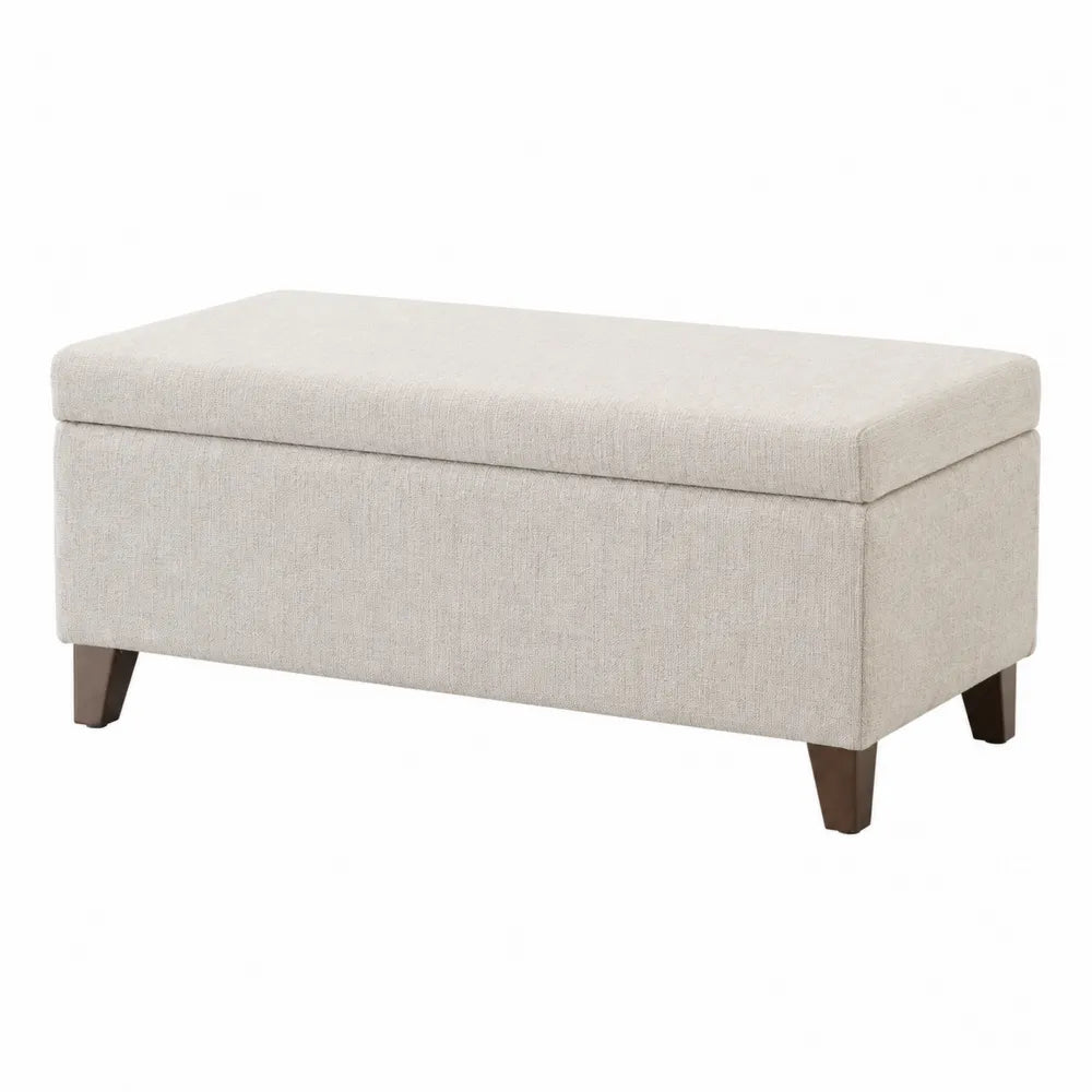 Panca contenitore rettangolare imbottita in tessuto poliestere beige chiaro con gambe in legno marrone scuro 110 x 40 x 45 cm